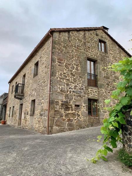 Foto d6aebaae-a68c-4220-85ce-404b3bc6dbad. Casa amb calefacció aparcament a Brión