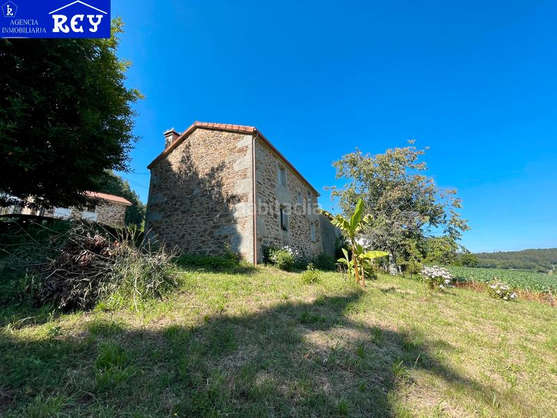 Foto d99385a3-613d-4843-bc58-9e218414e4f2. Masía casa de piedra con finca - portomedal en Val do Dubra