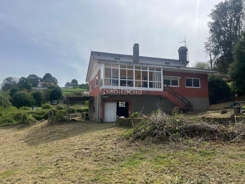 Foto 56572b0e-eeb2-4f54-a490-005b28b8c9e1. Casa amb aparcament a Vilaboa Sur Culleredo