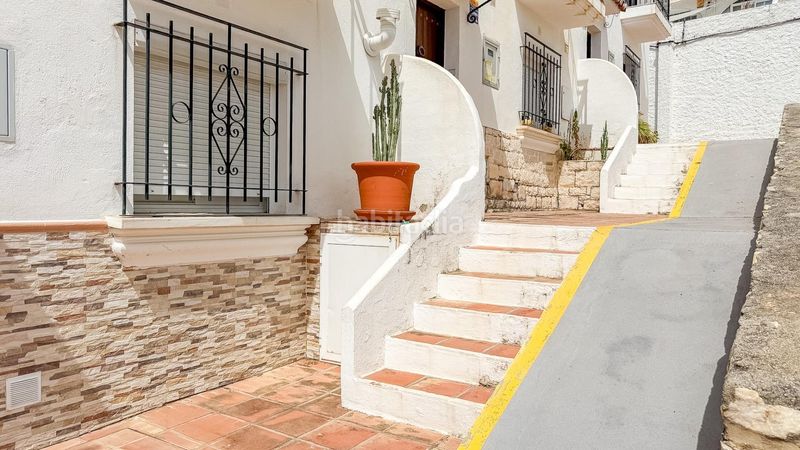 Foto dbbf73fb-f699-453e-afe9-69d9c0ddab85. Casa adossada amb calefacció aparcament piscina a Benalmádena