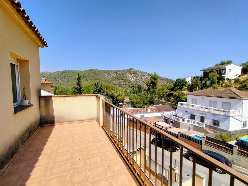 Foto cfda8328-0766-48f8-8116-6c606525b063. Casa adossada amb calefacció aparcament a Olivella