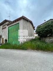Nau industrial a Valle de Losa. Casa pabellon de piedra
