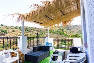 Casa adossada  Calle calle de elvira. Rebajado 45.000  inmho vende casa en macharaviaya