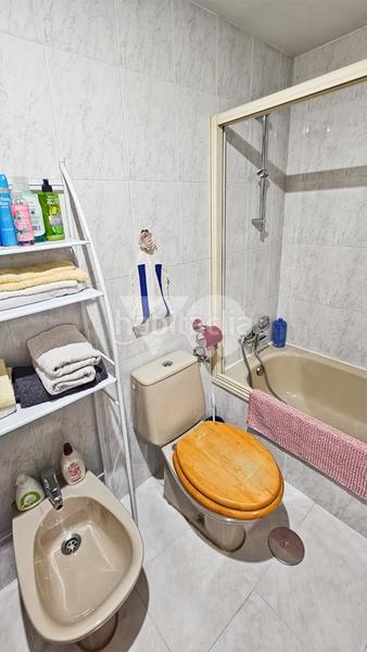 Foto 280eeb91-b092-461e-884f-25e04d7f0b35. Casa a schiera con riscaldamento parcheggio piscina in Alcorcón