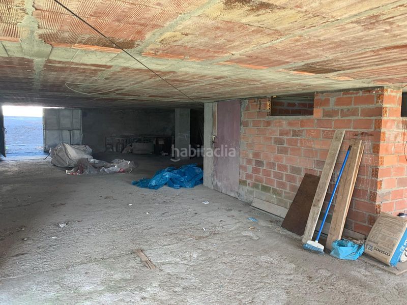 Foto 240bb18b-dbd8-49f9-8862-357d81216632. Edificio en Neda