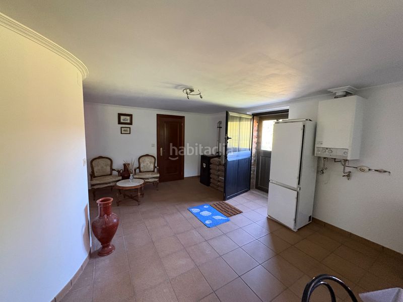 Foto 49fa9340-c53e-4551-b7c5-88f8fb818aaf. Casa amb xemeneia calefacció a Cedeira