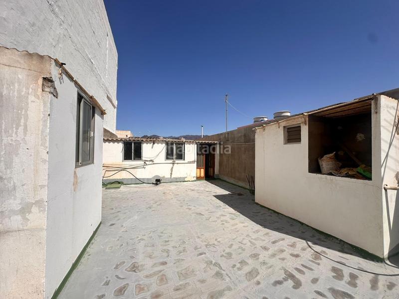 Foto dcd327d5-d683-4d90-81fc-47d50e89b774. Casa adossada a Vecindario - El Doctoral - Cruce de Sardina Santa Lucía de Tirajana