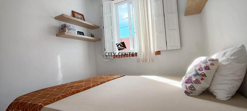 Foto 4b668e71-7185-4fdd-8391-253d5cfe1441. Casa adossada amb aparcament a Las Rosas Arona