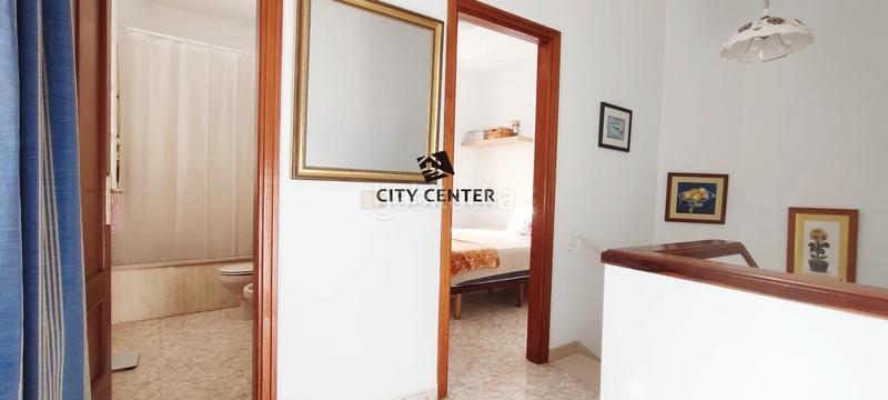 Foto 5313b671-6e0f-4210-b84f-2b154cbd522d. Casa adossada amb aparcament a Las Rosas Arona