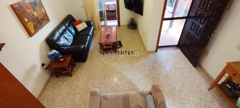 Foto bc85be4b-fdc5-4309-a736-bf619d1ad254. Casa adossada amb aparcament a Las Rosas Arona