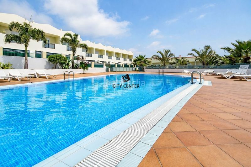 Foto 8fc8ad31-4855-45c0-b33a-4aac06ba558b. Casa adossada amb aparcament piscina a Playa Fañabé Alto Adeje