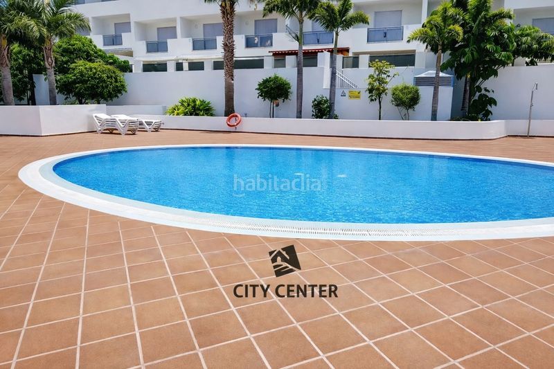 Foto a9aab1af-b95e-4206-bec7-9e72c26b66aa. Casa adossada amb aparcament piscina a Playa Fañabé Alto Adeje