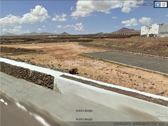 Foto debfbf70-6844-4ec0-bfb0-4b7306eb990d. Terreny residencial a costa Teguise Teguise