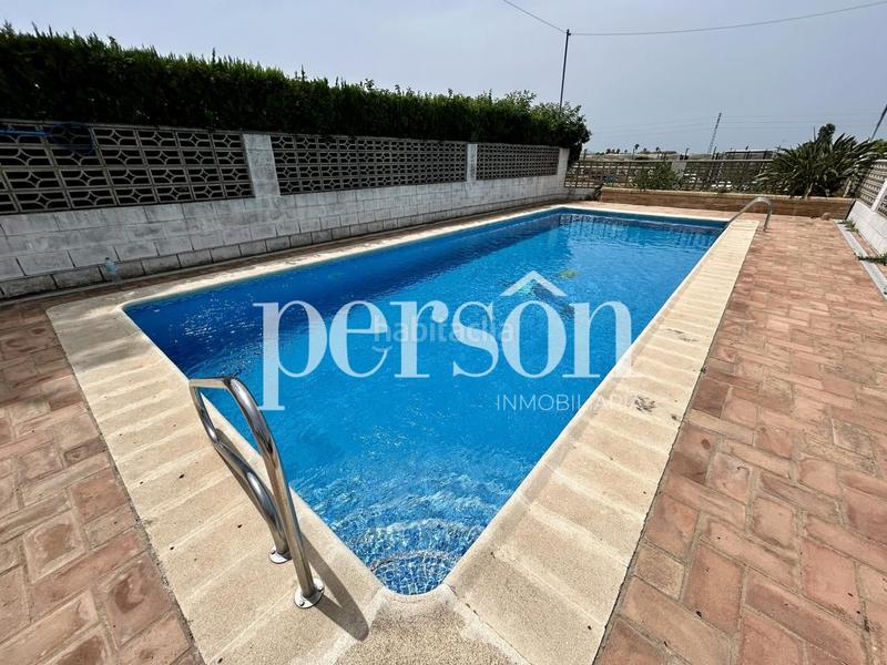 Foto 43d1e23a-e986-42fd-8a50-ed38d9328fea. Casa bifamiliare con piscina in Mareny Blau Sueca