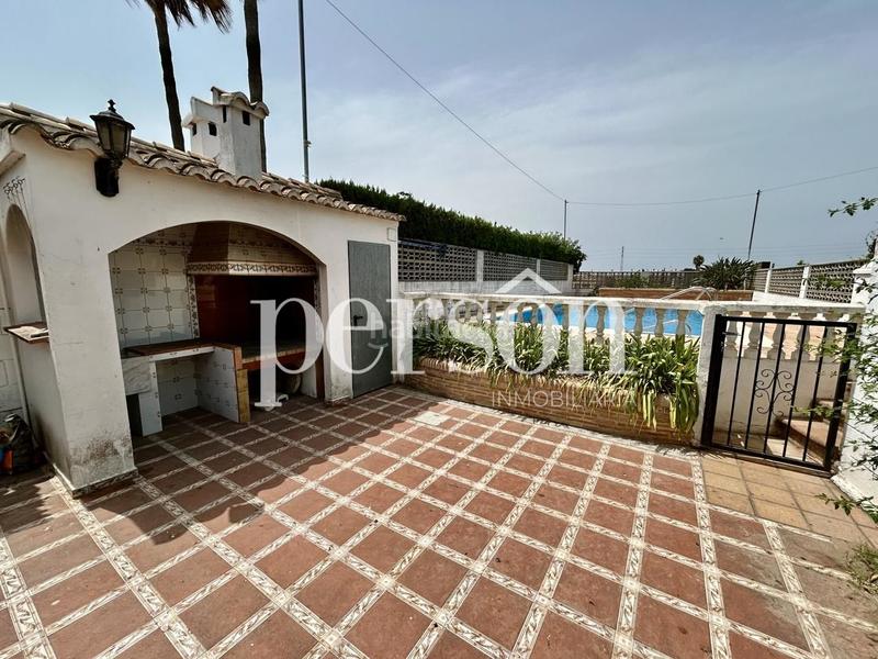Foto 92442160-e804-4f30-b0c7-ec861d888e54. Casa bifamiliare con piscina in Mareny Blau Sueca
