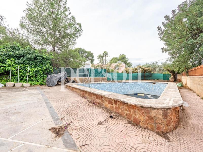 Foto 5e33ff3f-51ed-4426-a005-790c8fa45404. Maison avec piscine dans La Cañada Paterna