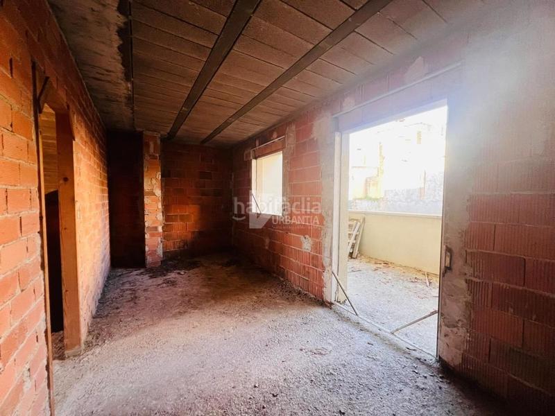 Foto 093bf263-604a-4585-826d-8719f0fb7a49. Casa adossada amb aparcament a Larraga