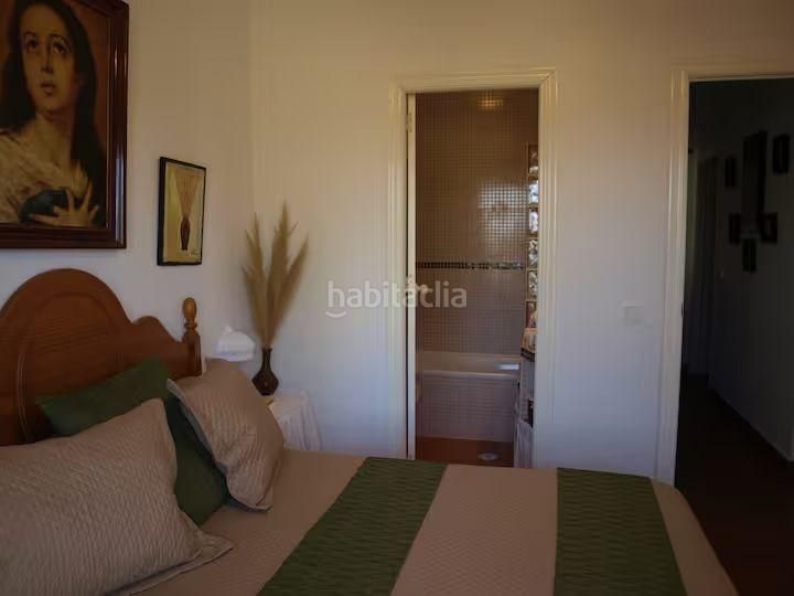 Foto b65c4364-0198-49c2-8808-020b64af82e9. Casa aparellada amb aparcament piscina a Lepe