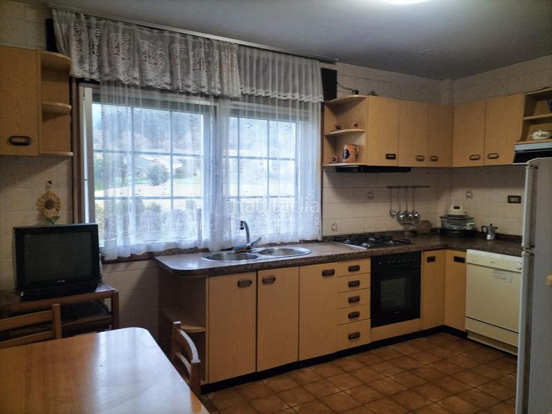 Foto 97d966c2-72f6-49f9-8d8f-1849e8577b14. Maison avec cheminée chauffage parking dans Abegondo