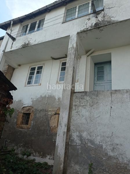 Foto 21dd41e9-ff25-4906-9075-f2a96a9c3ba2. Casa aparellada a Fonsagrada (A)