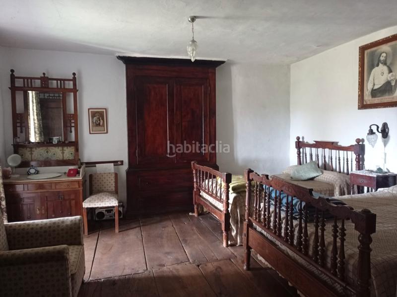 Foto f434e222-752f-4c84-bde8-837cb6807837. Casa aparellada a Fonsagrada (A)