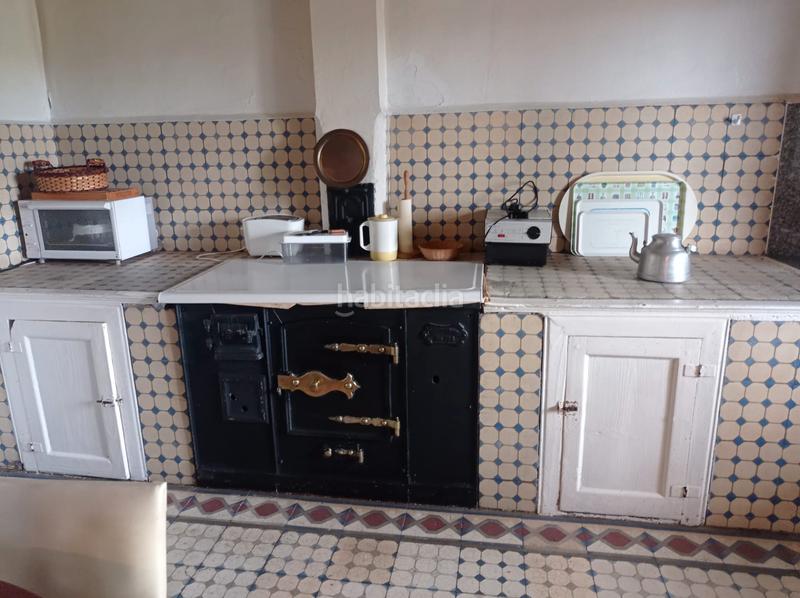 Foto f81ec096-034a-47a7-92e9-c2e0943b088b. Casa aparellada a Fonsagrada (A)