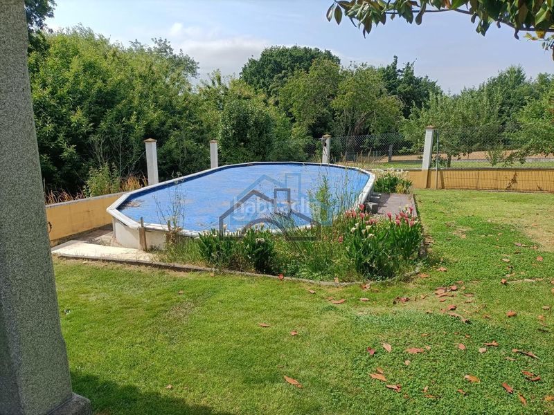 Foto 501a894c-b0b0-4100-88c8-d09f41a3a638. Xalet amb calefacció aparcament piscina a Cambre