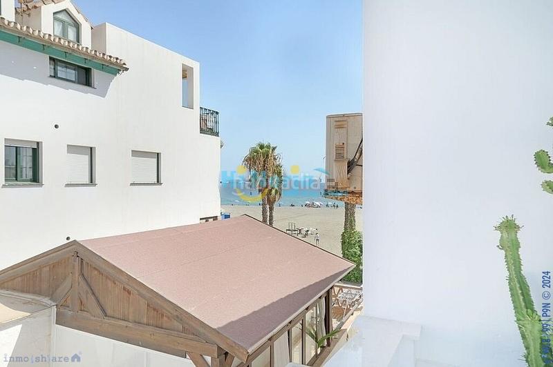 Foto ea8ab7fb-f374-45b1-a2d2-c26c4458bc78. Casa renovada 100 casa adosada de 2 dormitorios, aa terraza de 40 m2 en Caleta de Velez