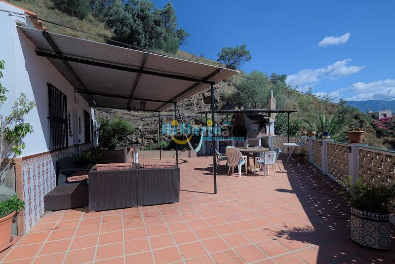 Foto d1fc52c6-8557-4a64-a78e-d2c79a176652. Casa con parcheggio piscina in Sayalonga