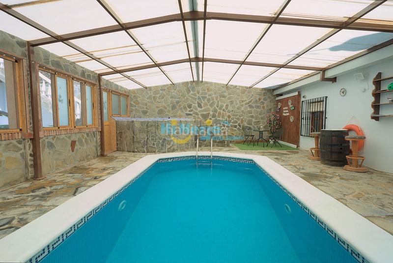 Foto fdd30343-36ed-45a1-8331-13dc70462635. Casa con parcheggio piscina in Sayalonga