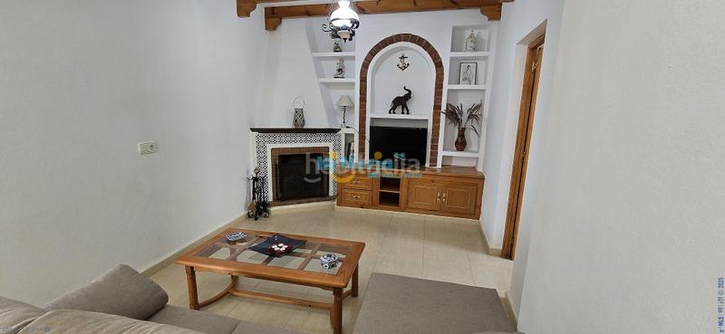 Foto 54f9ce88-ae06-494d-a54d-3d8057a513c5. Casa amb aparcament a Benajarafe