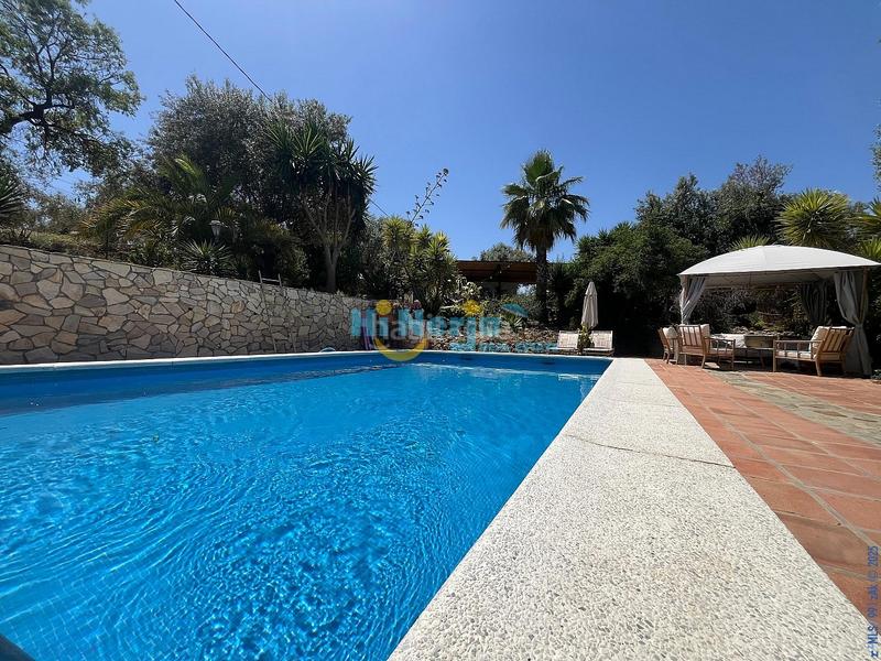 Foto 98193249-ec69-4e19-995a-bd723fe1aed5. Casa se vende villa independiente con licencia turística, piscina, y gran parcela , málaga en Riogordo