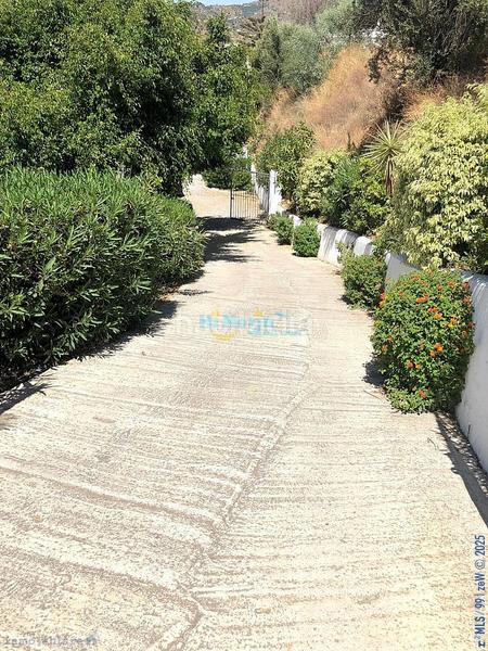 Foto 320c7bfc-b75b-4995-93da-d65f5cd5d080. House with parking pool in Torrox pueblo Torrox