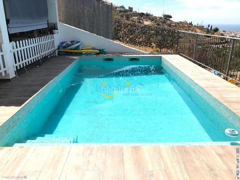 Foto 56ba568b-d760-4c46-8041-ef5a22dbed9a. House with parking pool in Torrox pueblo Torrox