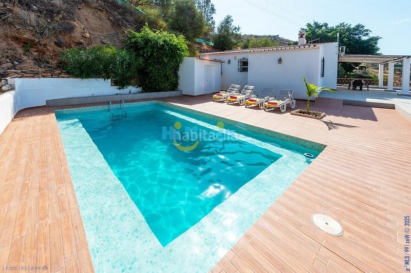 Foto 9645daf5-4b02-409b-b68d-985a23fdb4eb. House with parking pool in Torrox pueblo Torrox