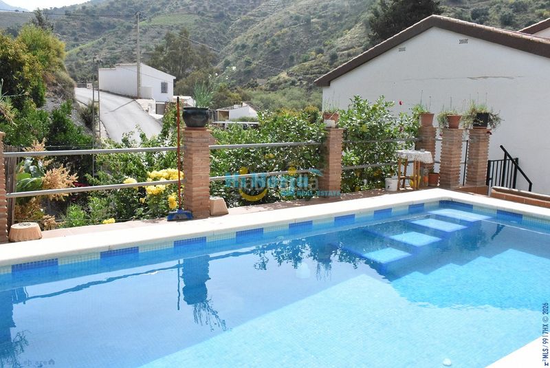 Foto d6132cee-4408-48e1-9984-021f471580c5. Casa amb aparcament piscina a Canillas de Aceituno