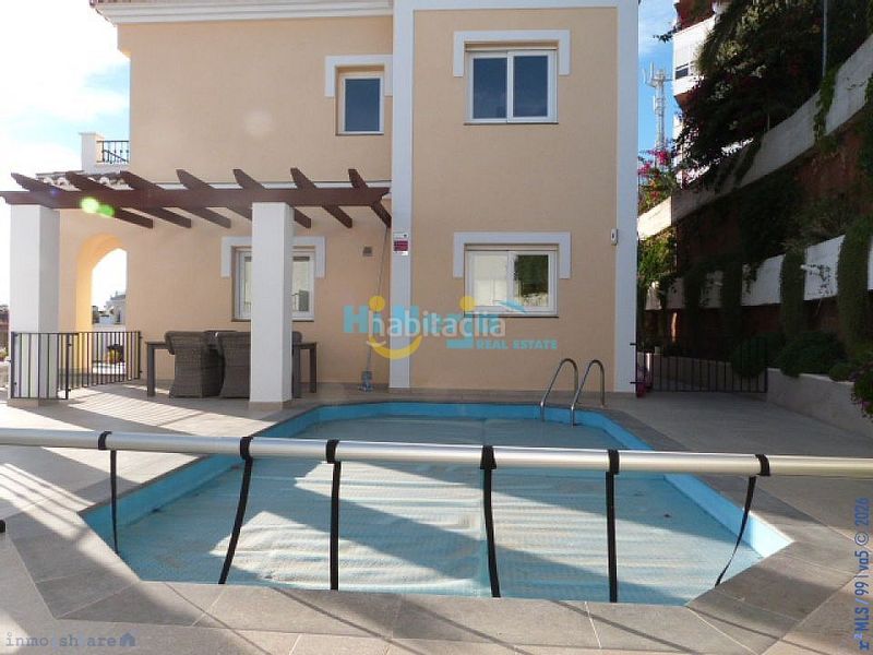 Foto 77ed6fb1-dc24-456a-bdac-df70c62213f0. Xalet amb aparcament piscina a El Peñoncillo Torrox