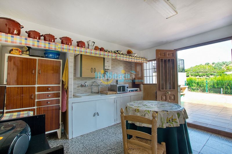 Foto 4da03e2d-a06f-4ca2-8d3e-7eaf60fe830e. Casa amb aparcament a Canillas de Aceituno