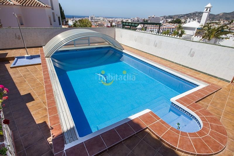Foto a80a60a3-37df-4a5d-add6-b7c757e3048c. Chalet villa 3 dormitorios piscina garaje chimenea en Nerja