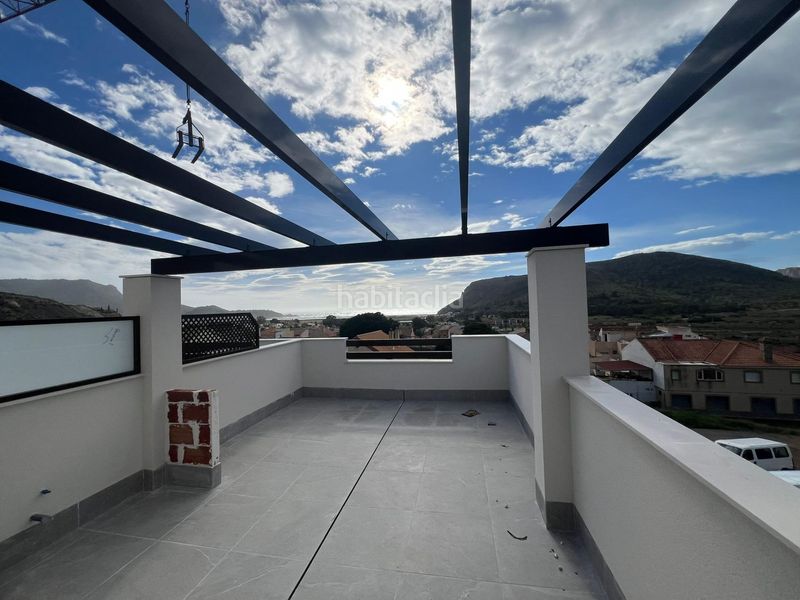 Foto 50fd5bd1-c2df-44ec-87b4-445984b3b39e. Casa adossada amb aparcament piscina a Portmán Unión (La)