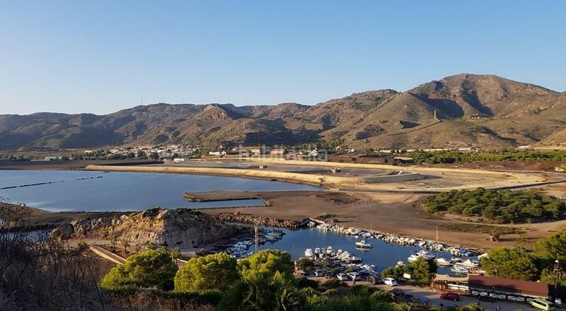 Foto 5577ae46-08a7-4e91-8cac-b256fe683ce8. Casa adossada amb aparcament piscina a Portmán Unión (La)