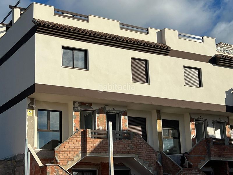 Foto 723d3692-cbc2-4597-9d70-64dd43befb73. Casa adossada amb aparcament piscina a Portmán Unión (La)