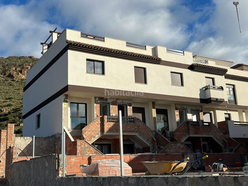 Foto 9c79da5c-a1d9-4255-911e-7db41e278c9f. Casa adossada amb aparcament piscina a Portmán Unión (La)