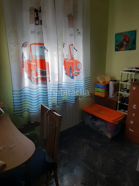 Foto cac3ab3a-ba43-4b84-a054-8a6e053374e2. Casa aparellada amb calefacció aparcament a Robledo