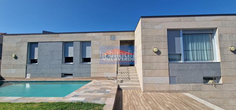 Foto 2afe4699-4b59-4b3d-89da-d44a9928f741. Casa chalet de piedra con piscina en Cangas pueblo Cangas