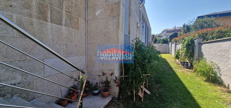 Foto 4c8bf7b9-159e-4b02-8cff-2c07bd6b7ba0. Casa chalet de piedra con piscina en Cangas pueblo Cangas