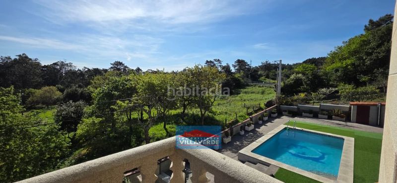 Foto baa70423-9f58-4161-b48d-015bd93bbb28. Casa amb aparcament a O Hío Cangas