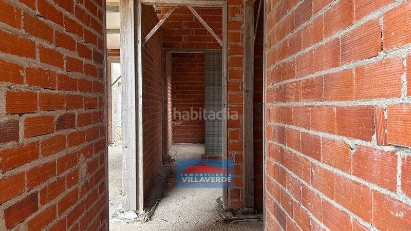 Foto 5d9b9adb-d76e-4a48-95bc-cbc5ade38de0. Casa  en exclusiva en zona de Aldán en estado de construcción. en Cangas