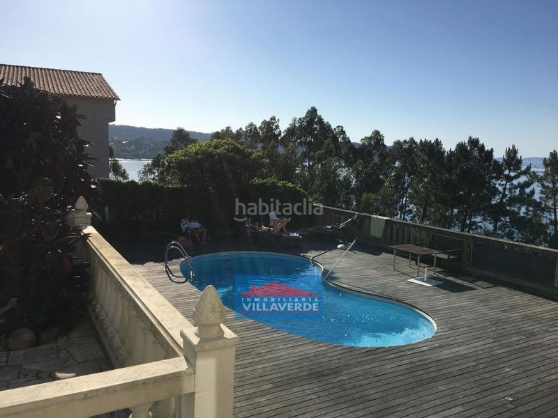 Foto 1b6bc795-a777-4f01-a2e8-360a19a7b7b5. Casa amb aparcament piscina a Aldán Cangas