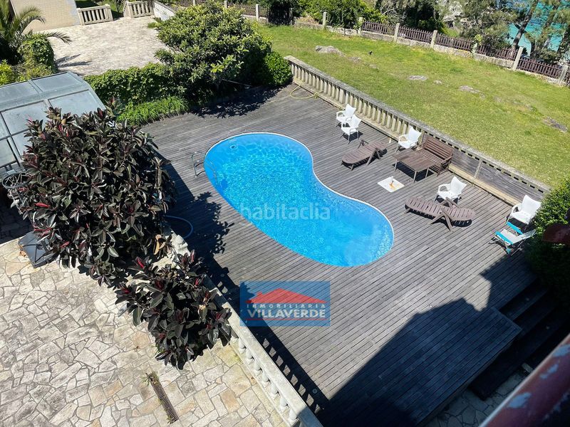 Foto ccc22f0b-9391-41b2-8319-b65ed852b07a. Casa amb aparcament piscina a Aldán Cangas